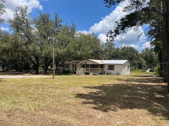 8.2 Acres of Residential Land with Home for Sale in Dade City, Florida
