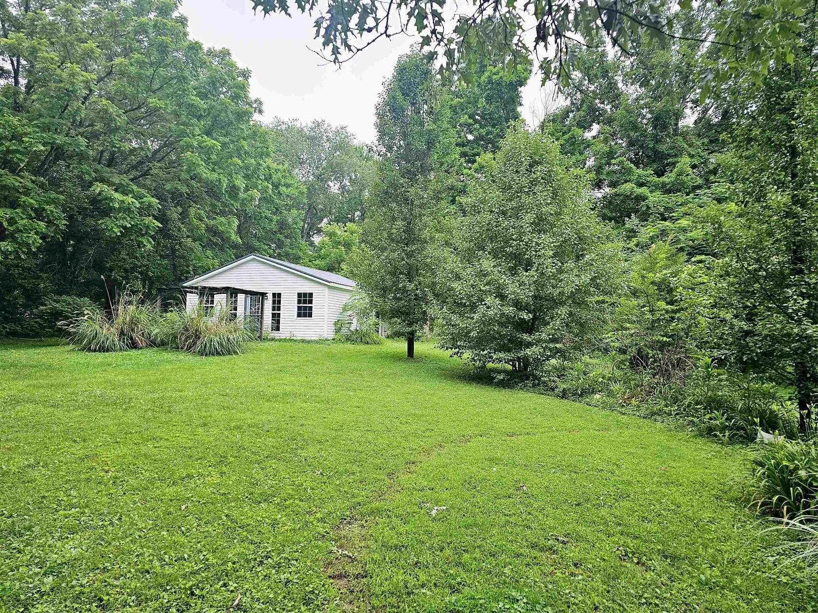 3.1 Acres of Residential Land with Home for Sale in Martin, Tennessee