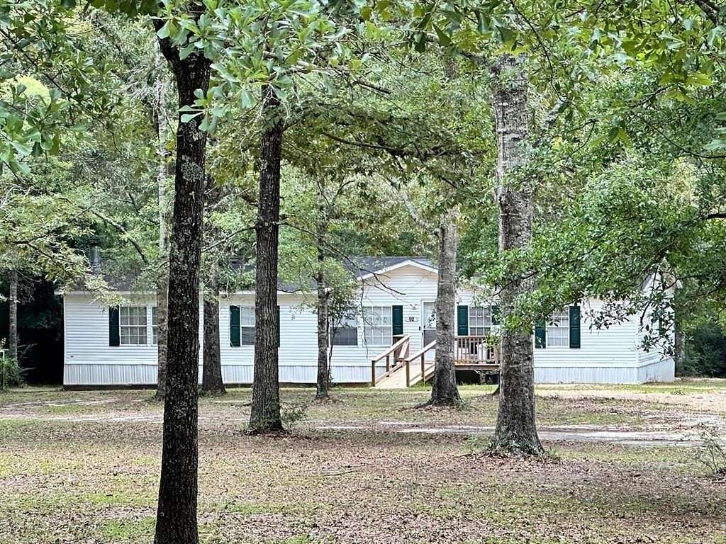 4.6 Acres of Residential Land with Home for Sale in Poplarville, Mississippi