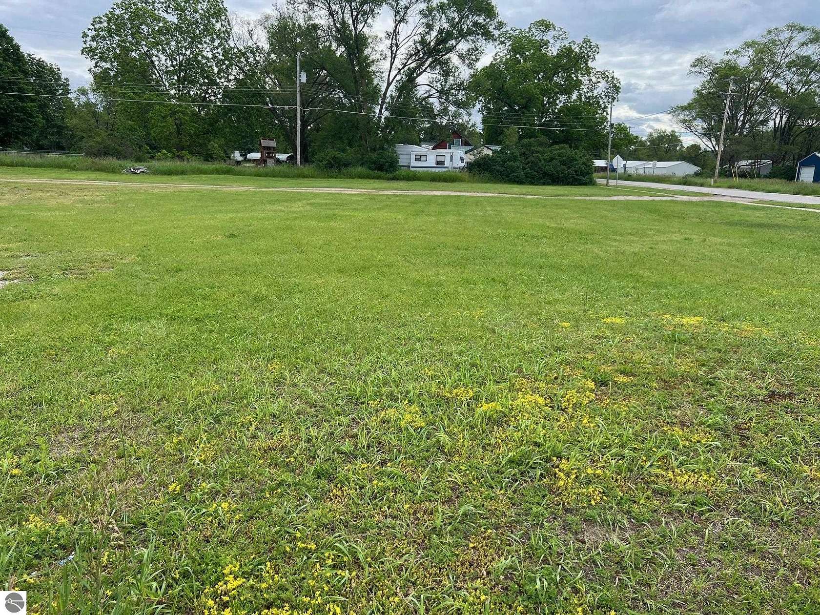 0.44 Acres of Commercial Land for Sale in Rapid City, Michigan