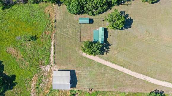 5.5 Acres of Land with Home for Sale in Springtown, Texas