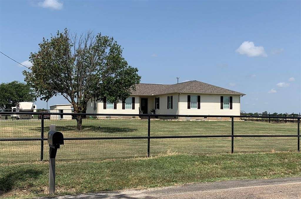5.007 Acres of Land with Home for Sale in Godley, Texas