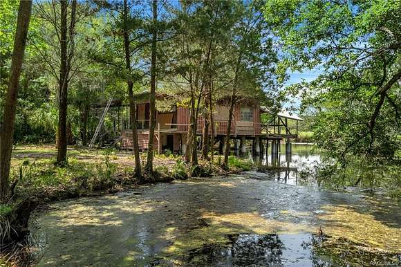 47 Acres of Recreational Land with Home for Sale in Homosassa, Florida