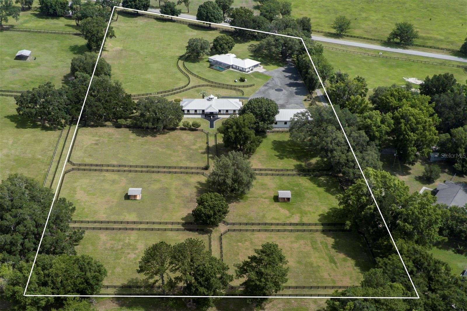 9.7 Acres of Land with Home for Sale in Reddick, Florida