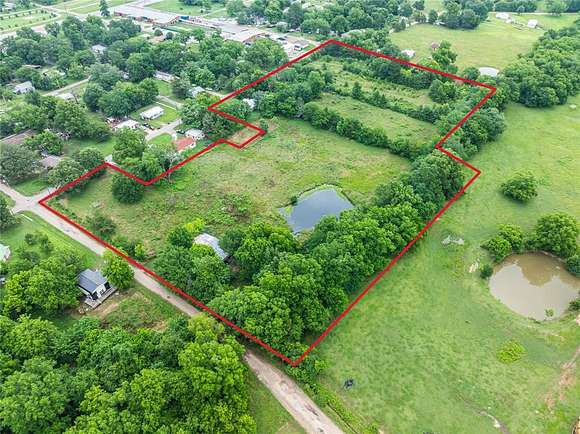 9.4 Acres of Residential Land with Home for Sale in Detroit, Texas