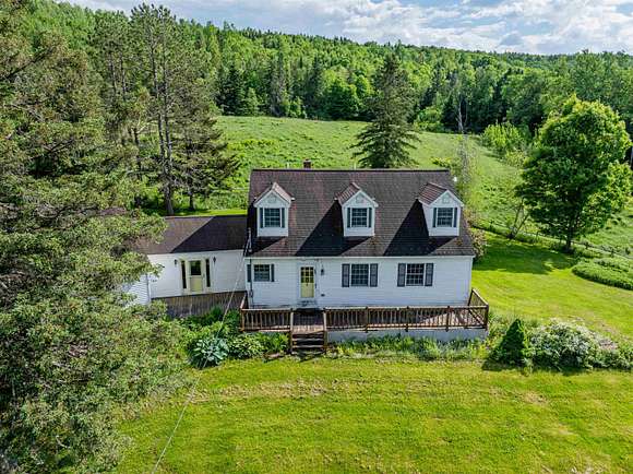 15.4 Acres of Land with Home for Sale in Colebrook, New Hampshire