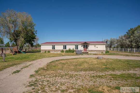 9.22 Acres of Land with Home for Sale in Rigby, Idaho