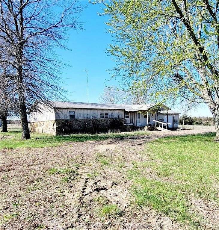 12.4 Acres of Land with Home for Sale in Iola, Kansas