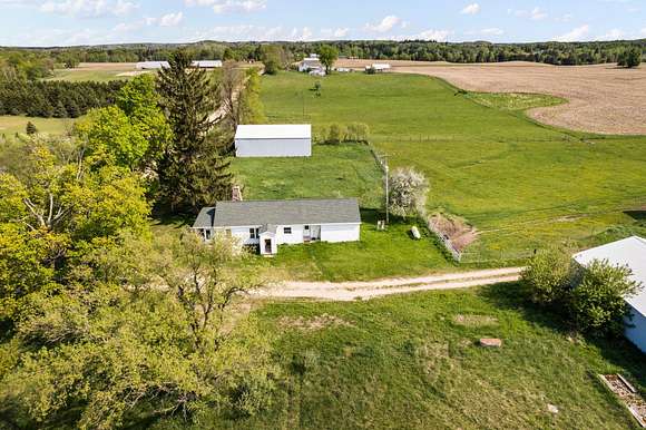 40 Acres of Land with Home for Sale in Luther, Michigan