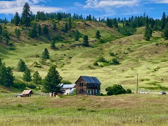10.82 Acres of Recreational Land with Home for Sale in Inchelium, Washington