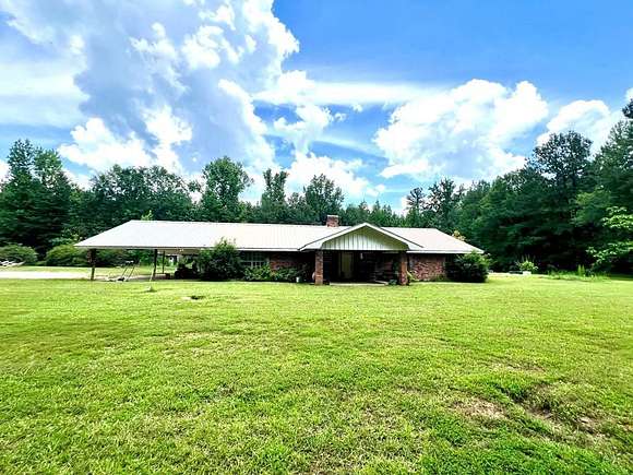 4.9 Acres of Residential Land with Home for Sale in Crosby, Mississippi