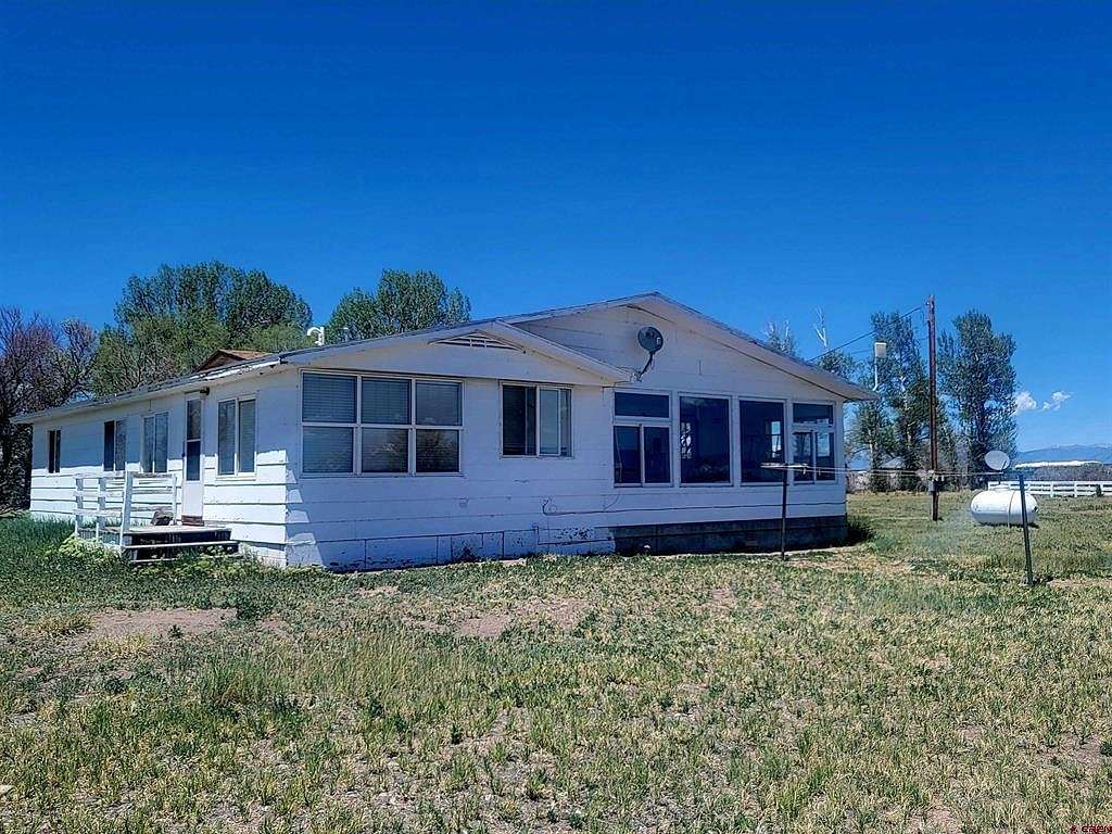 4.68 Acres of Residential Land with Home for Sale in Center, Colorado