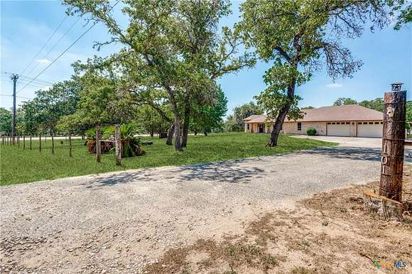 5.86 Acres of Residential Land with Home for Sale in Seguin, Texas
