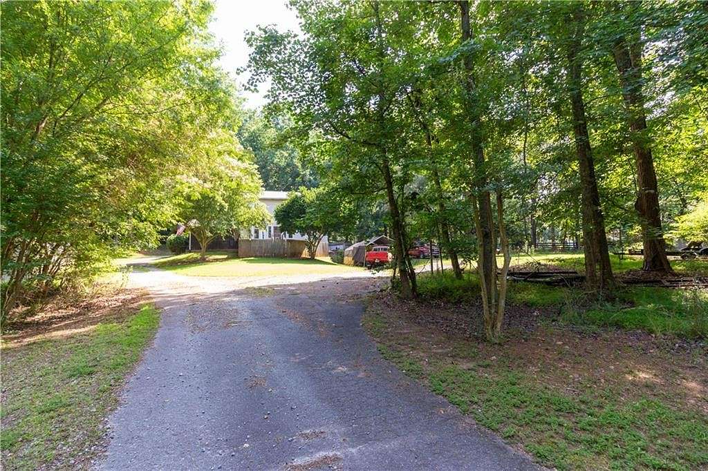 2.5 Acres of Residential Land with Home for Sale in Alpharetta, Georgia