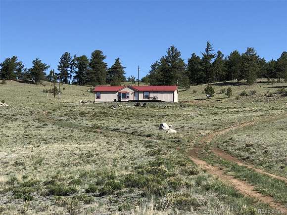 5 Acres of Residential Land with Home for Sale in Hartsel, Colorado