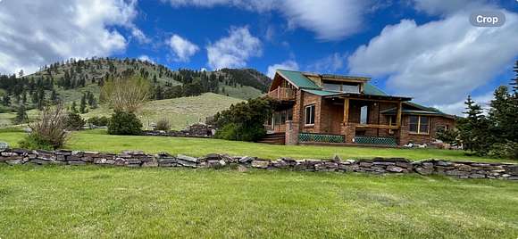 20.31 Acres of Recreational Land with Home for Sale in Wolf Creek, Montana