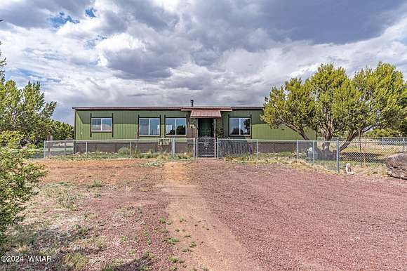 9.22 Acres of Residential Land with Home for Sale in Concho, Arizona