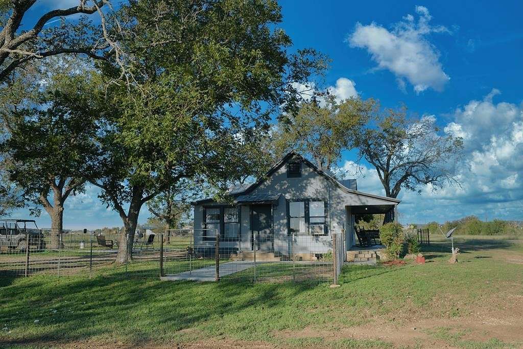 21 Acres of Agricultural Land with Home for Sale in Doss, Texas