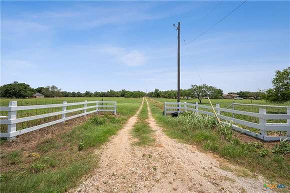 11.054 Acres of Land with Home for Sale in Luling, Texas
