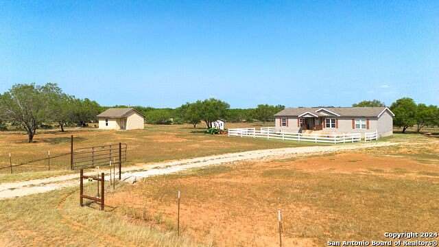 5 Acres of Residential Land with Home for Sale in Jourdanton, Texas