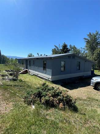 4.39 Acres of Residential Land with Home for Sale in Victor, Montana
