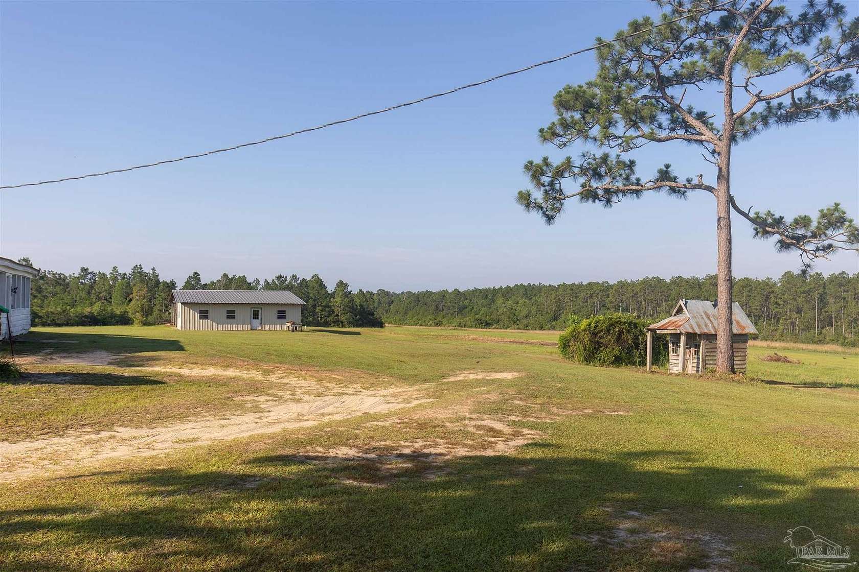 84 Acres of Recreational Land with Home for Sale in Seminole, Alabama