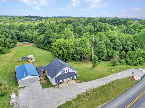 7.87 Acres of Land with Home for Sale in Munfordville, Kentucky