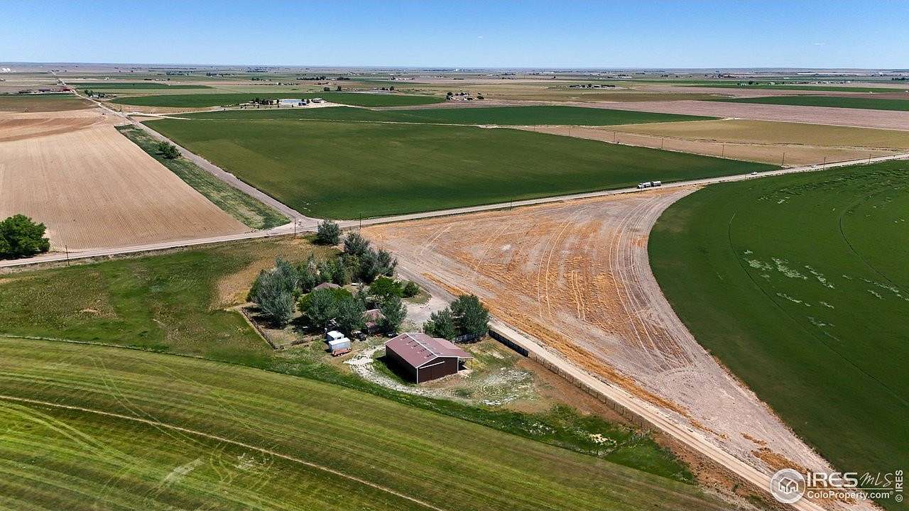 4.98 Acres of Residential Land with Home for Sale in Keenesburg, Colorado