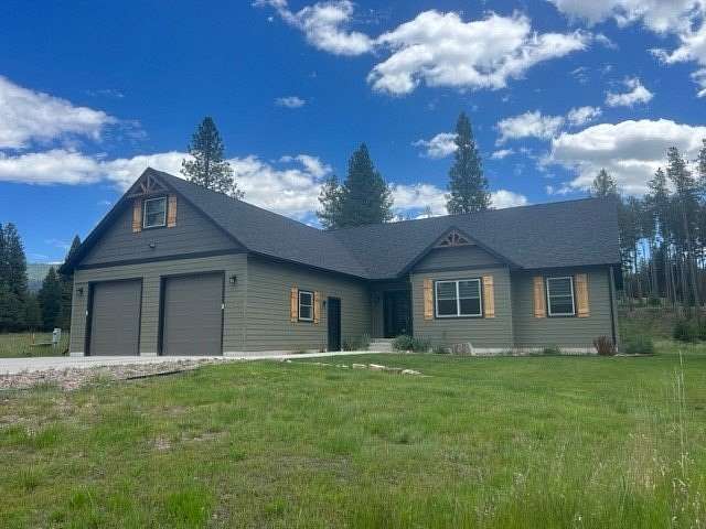 3.11 Acres of Residential Land with Home for Sale in Seeley Lake, Montana