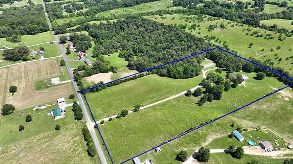 10.7 Acres of Land with Home for Auction in Cadiz, Kentucky