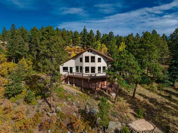2.95 Acres of Residential Land with Home for Sale in Angel Fire, New Mexico