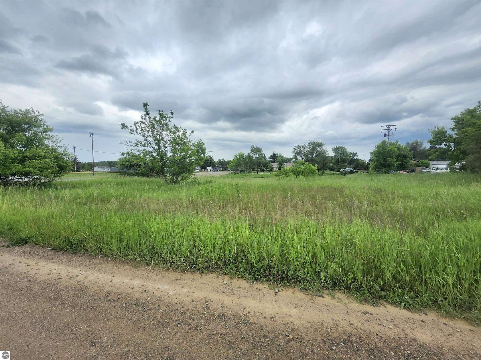 0.57 Acres of Commercial Land for Sale in Lupton, Michigan