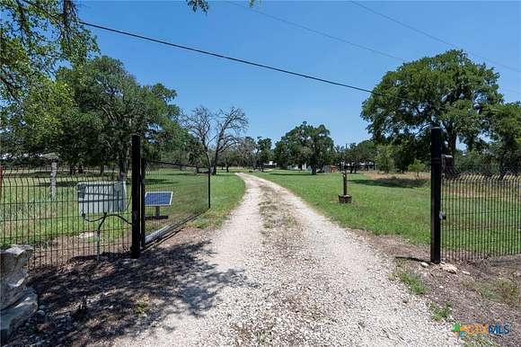 10 Acres of Residential Land with Home for Sale in Driftwood, Texas