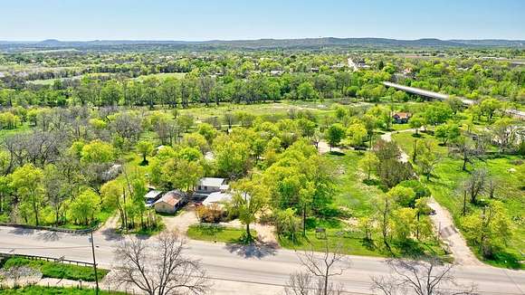 10.78 Acres of Land with Home for Sale in Center Point, Texas