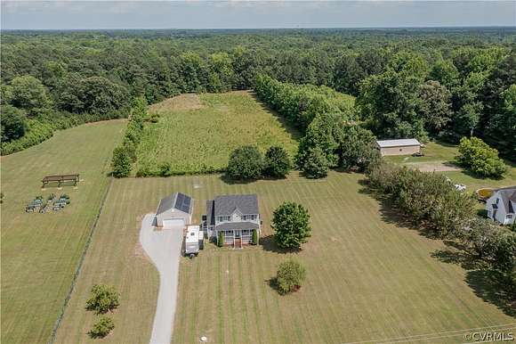 5.109 Acres of Land with Home for Sale in Disputanta, Virginia