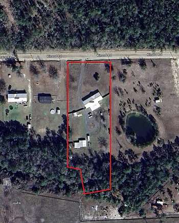 2 Acres of Residential Land with Home for Sale in Bryceville, Florida