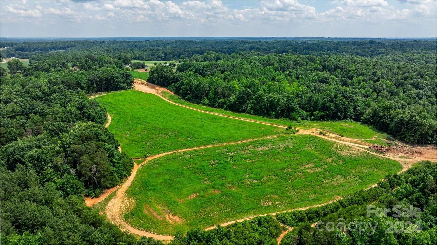 171.6 Acres of Agricultural Land with Home for Sale in Yadkinville, North Carolina