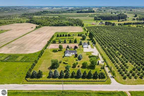 5 Acres of Land with Home for Sale in Williamsburg, Michigan