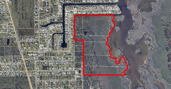 56.27 Acres of Land for Sale in Bokeelia, Florida