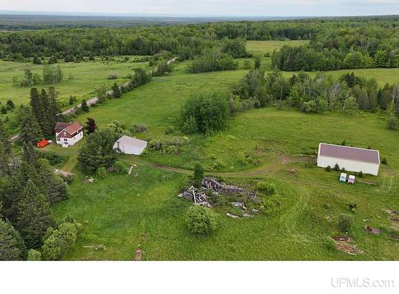 52 Acres of Agricultural Land with Home for Sale in Chassell, Michigan