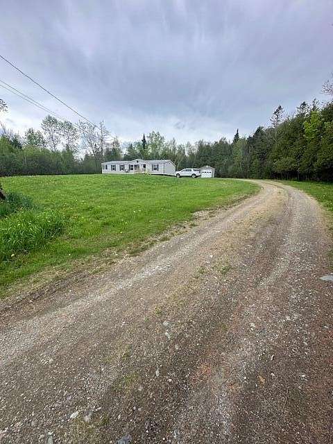 10 Acres of Residential Land with Home for Sale in Corinna, Maine