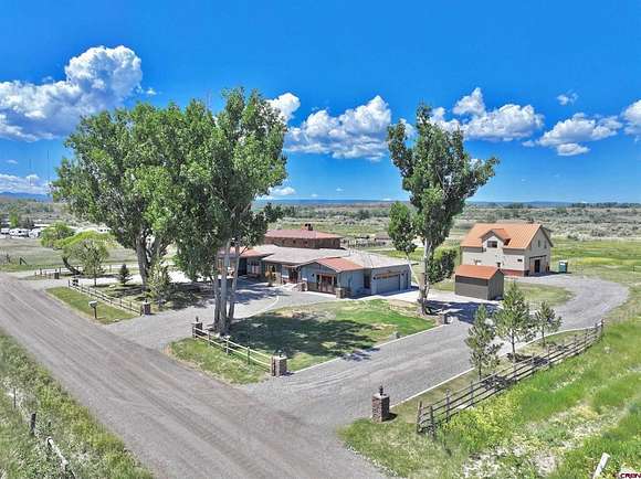 4.542 Acres of Residential Land with Home for Sale in Montrose, Colorado