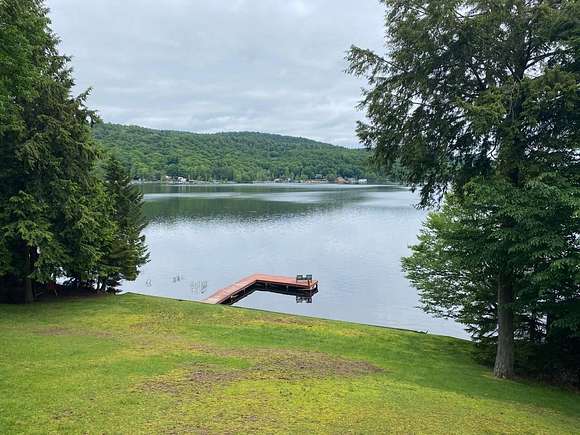 3.8 Acres of Residential Land with Home for Sale in Old Forge, New York