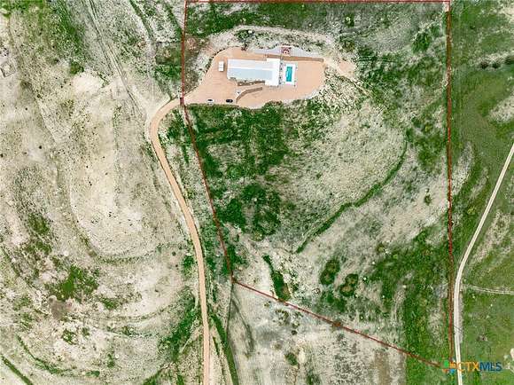 64.97 Acres of Land with Home for Sale in Lampasas, Texas