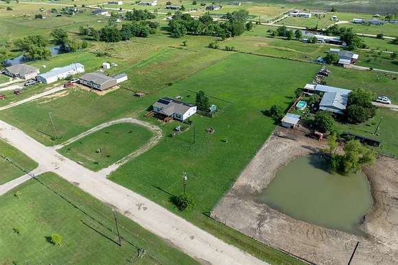 2.1 Acres of Residential Land with Home for Sale in Quinlan, Texas