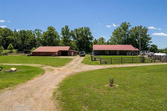 9.58 Acres of Land with Home for Sale in Patterson, Missouri