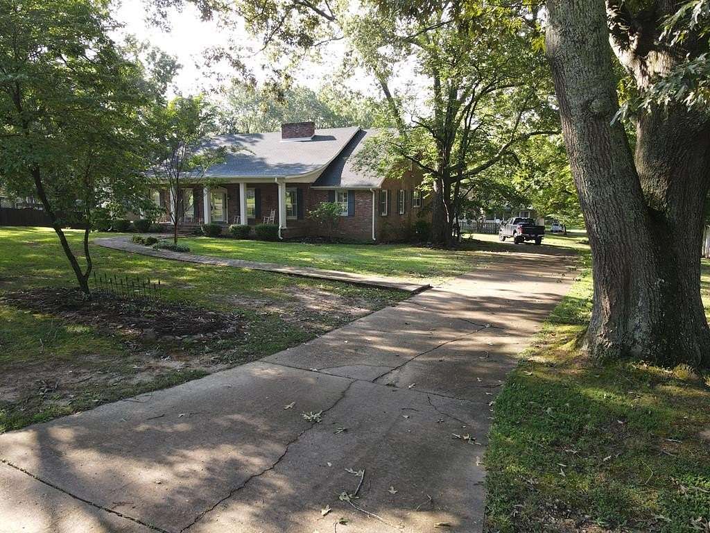 2.6 Acres of Residential Land with Home for Sale in Huntingdon, Tennessee