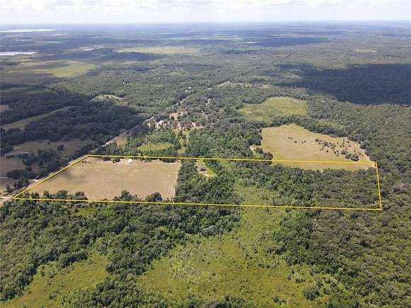 51.7 Acres of Land with Home for Sale in Micanopy, Florida