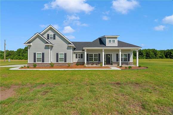 6.38 Acres of Residential Land with Home for Sale in Ludowici, Georgia