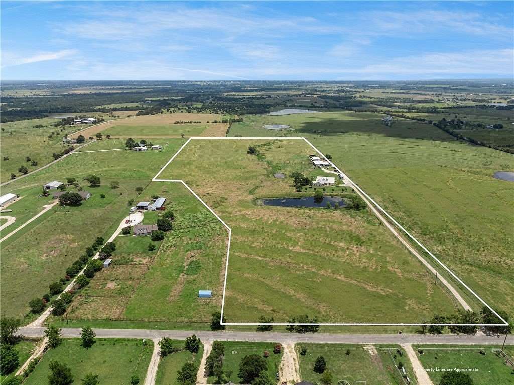 27.47 Acres of Agricultural Land with Home for Sale in Robinson, Texas